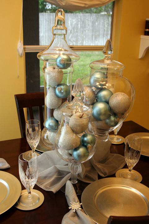 jars with blue and silver ornaments will make up a lovely Christmas centerpiece or a decoration, make it easily