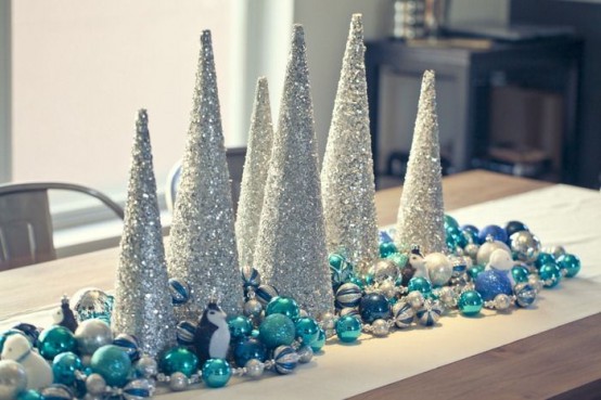 a simple yet cute christmas centerpiece made of tabletop trees