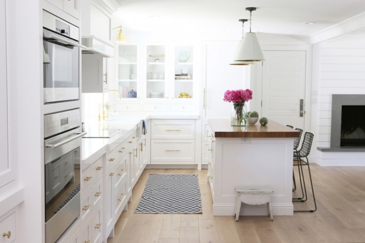 Chic White Kitchen Remodel With Brass Touches