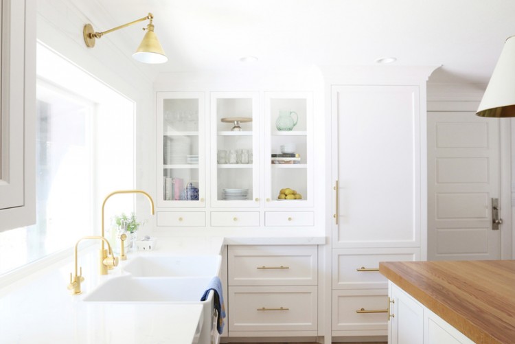 Chic White Kitchen Remodel With Brass Touches