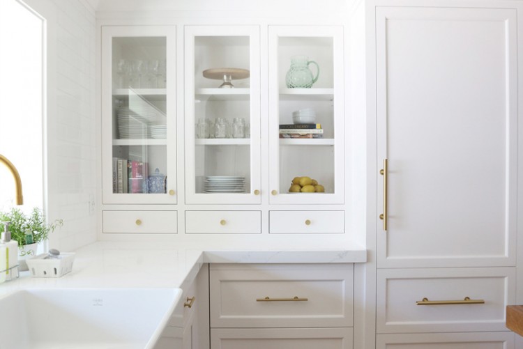 Chic White Kitchen Remodel With Brass Touches