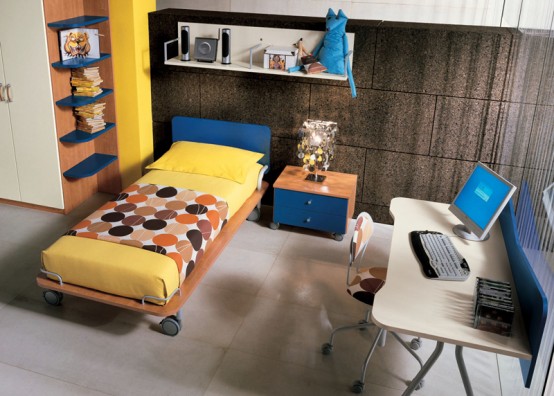a small and bright teen bedroom with a brown accent wall, a bed with colorful and printed bedding, a desk and a chair, a open shelving and a nightstand plus blue touches