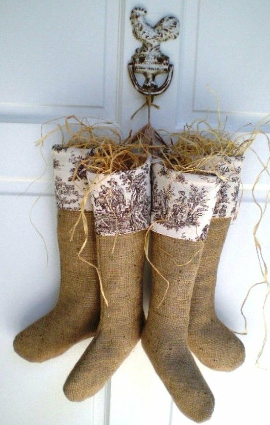 burlap and printed fabric stockings with hay and dried grass are amazing to style a vintage rustic space