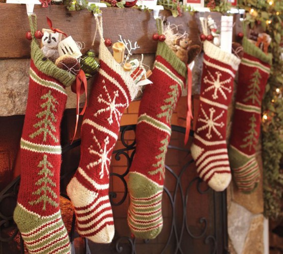 red, green and white knit stockings are pretty traditional decor at Christma,s you can hang them anywhere, though a mantel is the most popular place