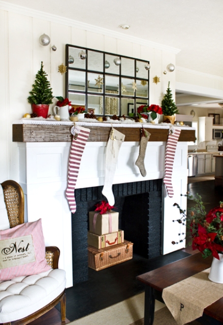 striped red and white, white and tan stockings make the space look festive without any other decor and add coziness to it
