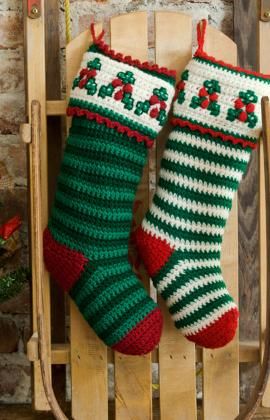 red, green and white crochet stockings are traditional decor for Christmas and they will add a touch of color to your space