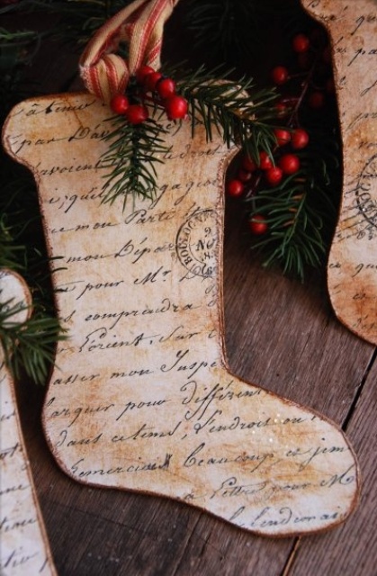 cardboard Christmas stockings with calligraphy, evergreens and berries are amazing Christmas ornaments that you can DIY
