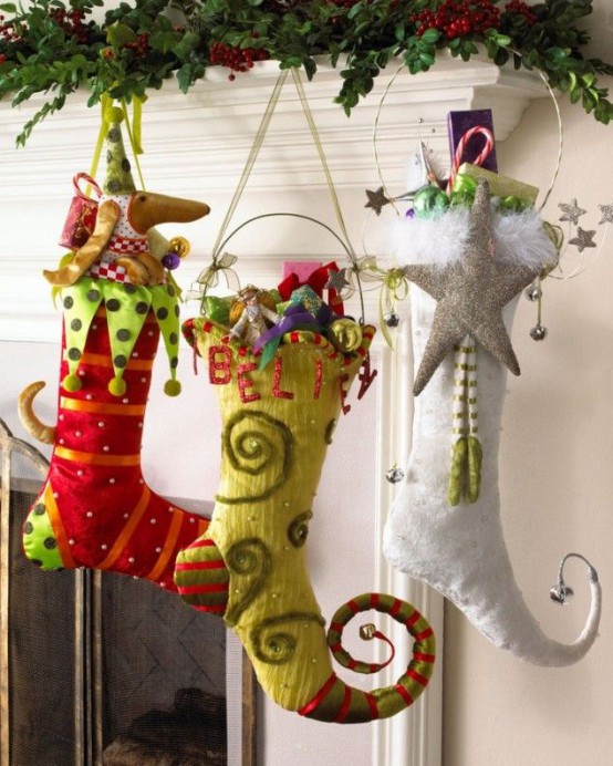 crazily colorful elf-shaped stockings with bright decor, detailing and appliques for a bright and fun touch in the space