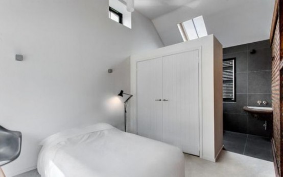 a white wardrobe is a cool space divider for a bedroom and a bathroom, it can be a nice idea for any bedroom you have