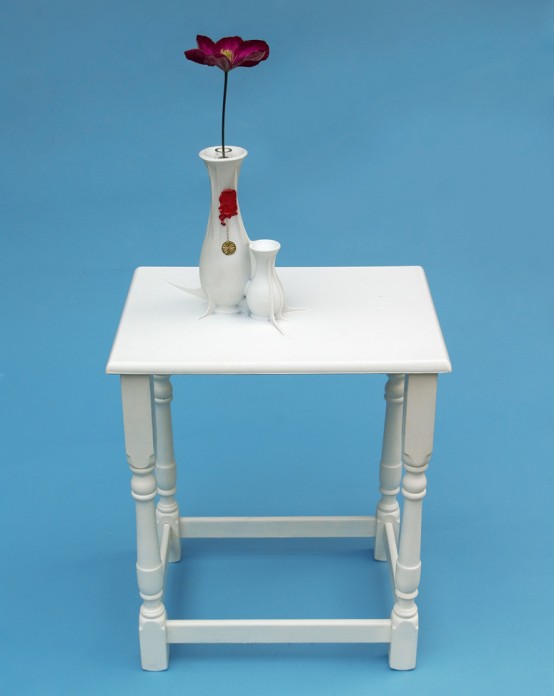 Pure White Coffee Table With BuiltIn Vases DigsDigs