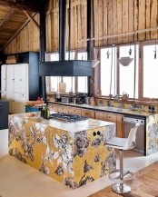 bright tiles forming a floral pattern add interest to this kitchen