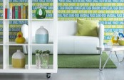 Colorful Living Room With Plain Furniture And Heavily Patterned Wallpaper
