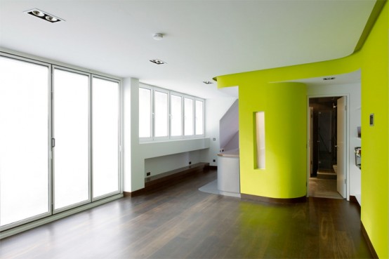 Colorful Loft Design With Wall Integrated Service Spaces