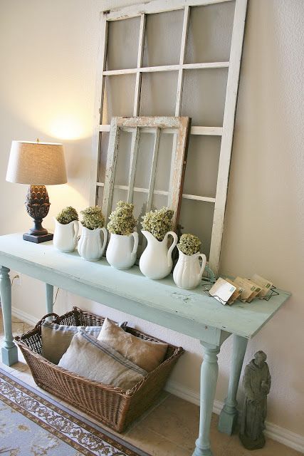 If you have some space by the wall put a console table there. It could be a great place to create beautiful decorations and change them from time to time. 