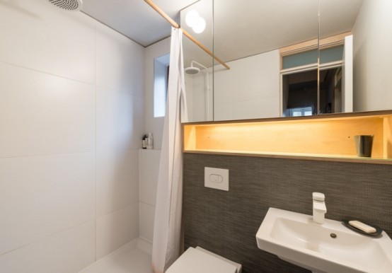 Compact Modern Apartment With Lots Of Plywood In Decor