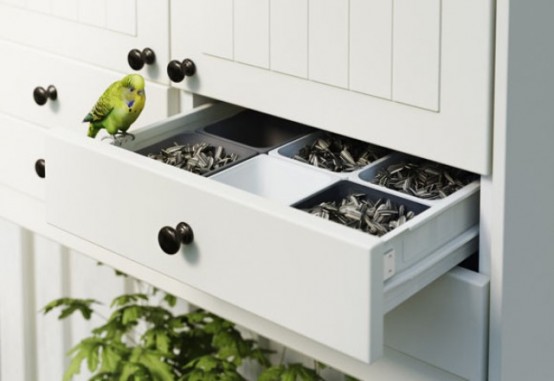 Completely White Kitchen With Lots Of Greenery