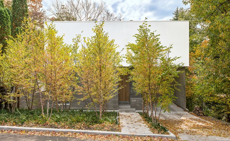 Concrete Modern House Made Of Several Stacked Volumes