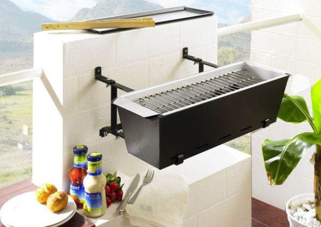 a mini metal grill box that can be attached to a wall or a railing is a very cool solution for a small balcony if you love grilled food