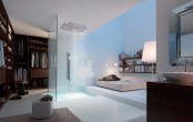 a minimalist white bedroom with a low bed and a large rain shower next to it is a cool idea with a neutral color scheme