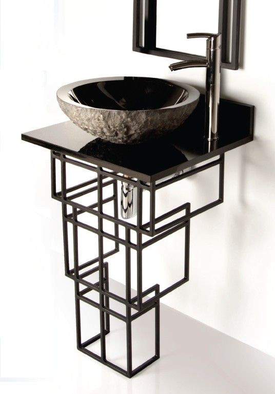 a stylish geometric vanity done in black, with a metal base and a black stone countertop is a cool idea for an art deco bathroom with elegant style