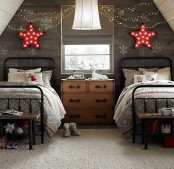 star marquee lights over the beds, lights and snowflake decals are all you need to make the kids’ room look very festive and holiday-like