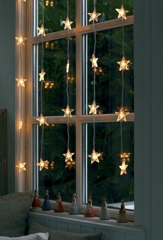 cute star garlands hanging down on the window are amazing for adding a slight festive feel to the room, whether it's a kids' or any other one