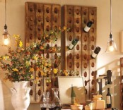 simple reclaimed wood bottle holders that are attached to the wall are a cool idea