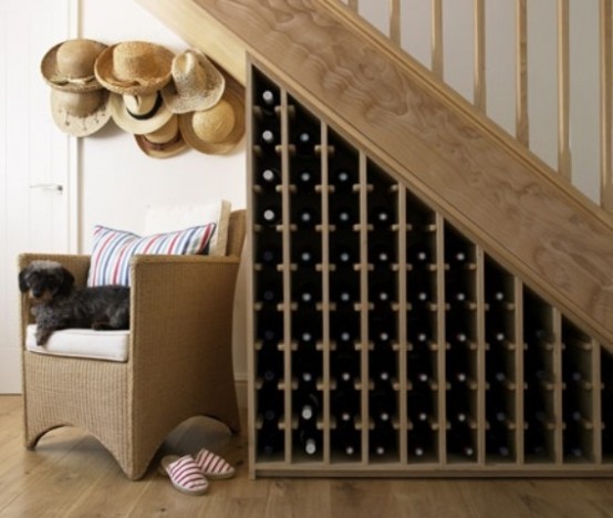 under the stairs wine bottle storage is a creative idea that doesn't take any floor space