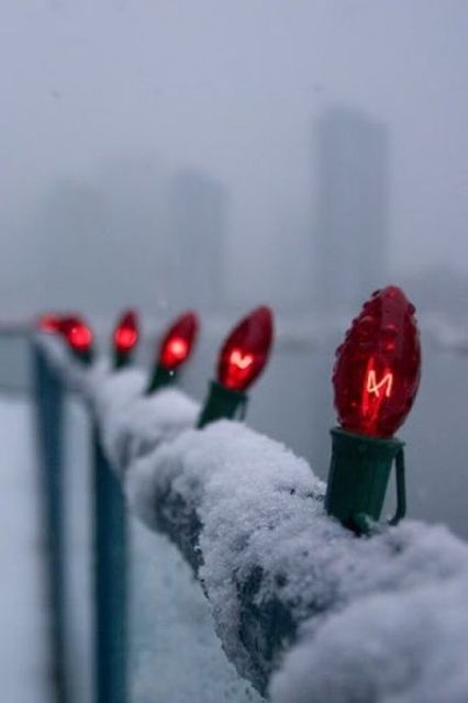simple red bulbs attached to the railing will make your balcony fele much more festive and cool