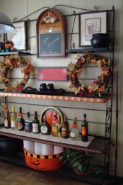 fall wreaths of vine with bright fall leaves are simple fall-inspired decorations for your kitchen