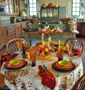fall decor done with hay, pumpkins, gourds, corn husks – all of them are faux, which means very durable