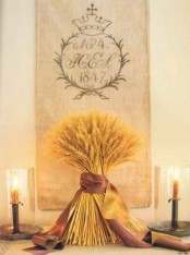 a wheat arrangement with silk ribbon can be a nice decoration or a centerpiece for a cool fall party