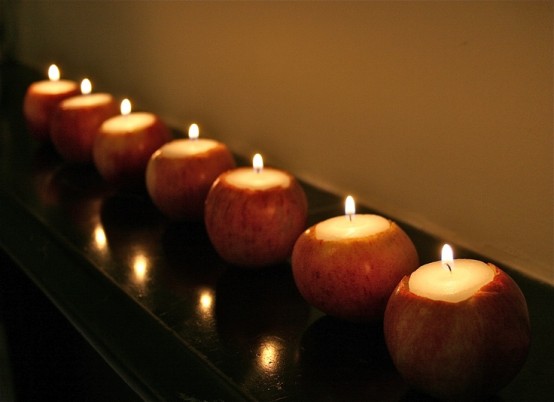 apples cut inside and with candles can become nice candleholders for a fall party or just for the fall