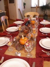 a table setting for a Halloween or fall party