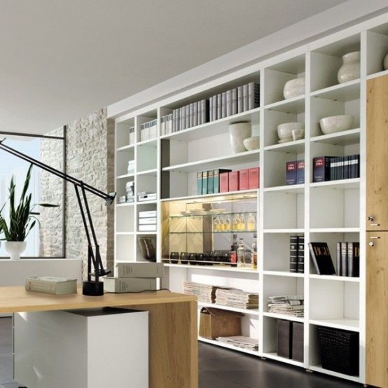 a whiet home office with an oversized open storage unit, a stained and white desk, a potted plant is a cool working space with lots of storage