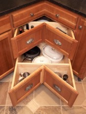 such corner drawers are a cool way to use that awkward space and get maximum of it