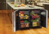 a storage kitchen island with an additional fridge in its side is great for storing food