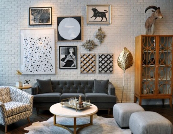 an eclectic living room with a white brick wall, which adds texture while being neutral enough