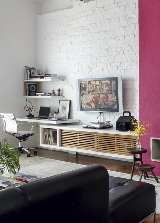 a contemporary living room with a white brick wall and a fuchsia accent plus dramatic dark furniture