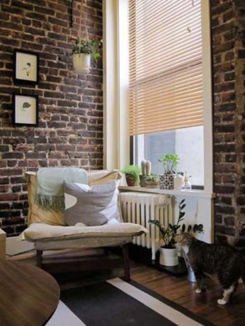 original dark brick walls are highlighted with white grout and bring much texture inside