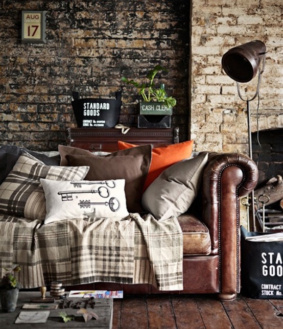 a combo of light-colored and dark-colored brick makes the living room textural and catchy giving it a masculine feel