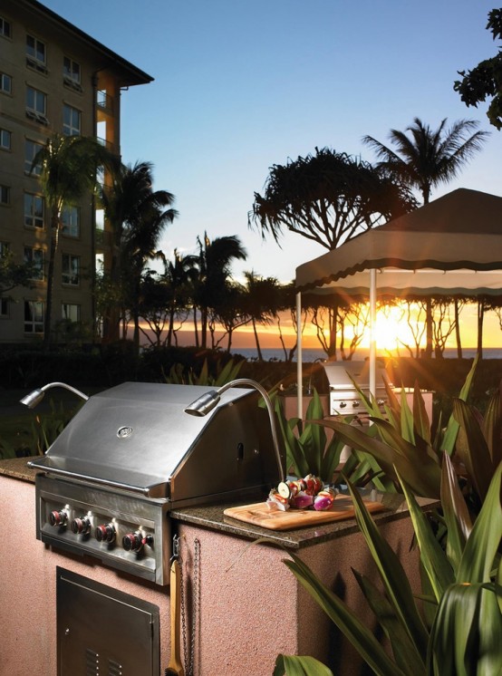 a simple outdoor bbq zone with a pink stone base and a grill on it is easy to build to enjoy freshly grilled food