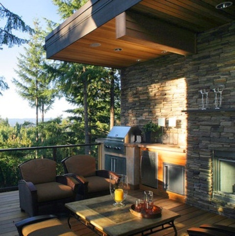 Installing an outdoor kitchen on a deck with a view is a great way to make the cooking process much more pleasant.