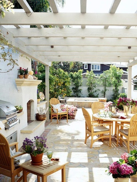 Even a pergola could provide enough protection for an outdoor cooking and dining.