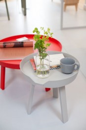 a duo of coffee tables in grey and bold red is a lovely solution for any home, you get matching tables that contrast in color