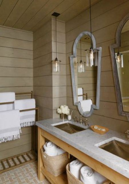 a light-colored contemporary bathroom with much wood all over, a wooden vanity and a stone countertop