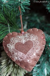 a printed felt heart Christmas ornament with beads is a simple and stylish idea for holidays