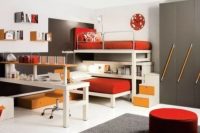 a stylish modern teen boy bedroom with white and grey walls, bunk beds, a desk, a grey wardrobe and touches of mustard and red