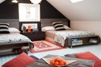 a rustic attic shared teen boy bedroom with pallet beds wiht storage, a pallet coffee table and skylights