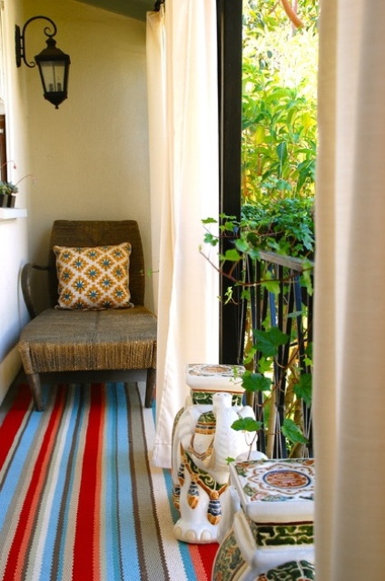 A curtain could provide some privacy to a small seating area.